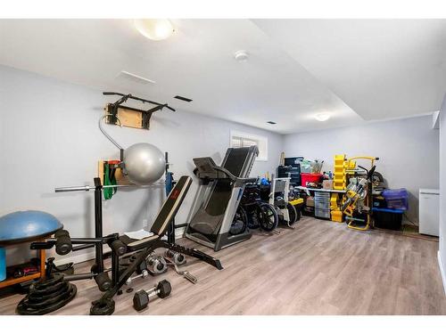 317-10 Auburn Bay Avenue Se, Calgary, AB - Indoor Photo Showing Gym Room