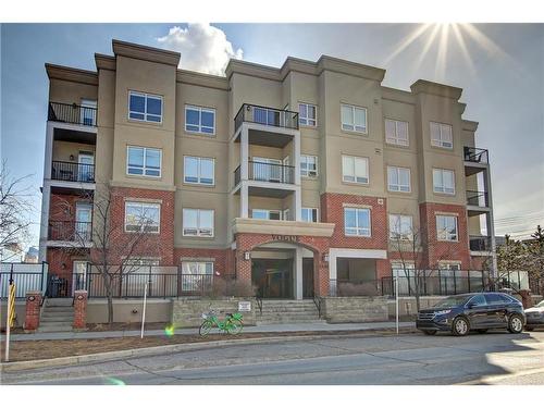 209-1108 15 Street Sw, Calgary, AB - Outdoor With Balcony With Facade
