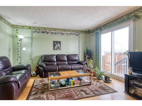 605-350 Falconridge Crescent Ne, Calgary, AB - Indoor Photo Showing Living Room