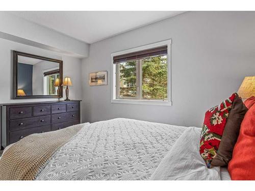 102-101 Montane Road, Canmore, AB - Indoor Photo Showing Bedroom