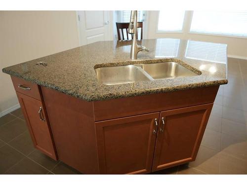 183 Evansridge Circle Nw, Calgary, AB - Indoor Photo Showing Kitchen With Double Sink