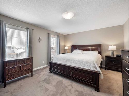 12 Yorkstone Heath Sw, Calgary, AB - Indoor Photo Showing Bedroom