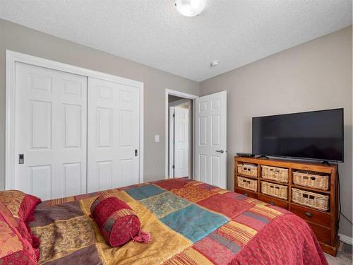 12 Yorkstone Heath Sw, Calgary, AB - Indoor Photo Showing Bedroom