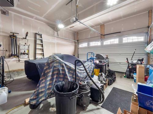 12 Yorkstone Heath Sw, Calgary, AB - Indoor Photo Showing Garage