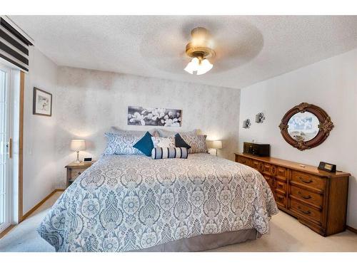 108 Hidden Vale Crescent Nw, Calgary, AB - Indoor Photo Showing Bedroom