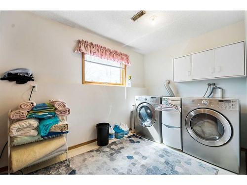 108 Hidden Vale Crescent Nw, Calgary, AB - Indoor Photo Showing Laundry Room