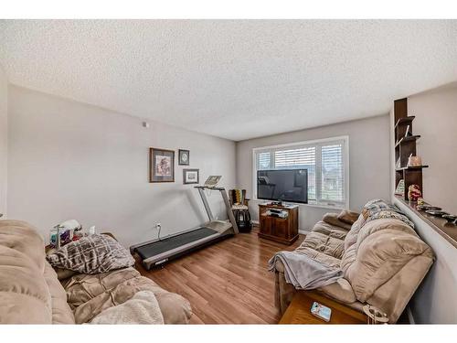 3816 Dover Ridge Drive Se, Calgary, AB - Indoor Photo Showing Living Room