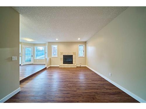 2811 Signal Hill Drive Sw, Calgary, AB - Indoor With Fireplace