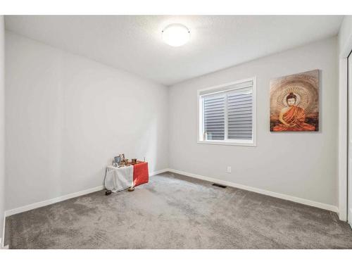42 Wolf Hollow Way Se, Calgary, AB - Indoor Photo Showing Other Room