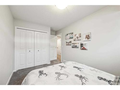 42 Wolf Hollow Way Se, Calgary, AB - Indoor Photo Showing Bedroom