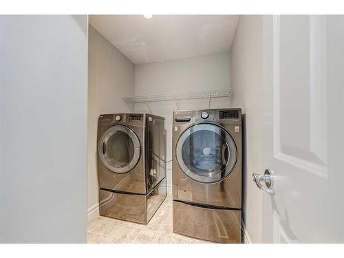 43 Prominence Path Sw, Calgary, AB - Indoor Photo Showing Laundry Room