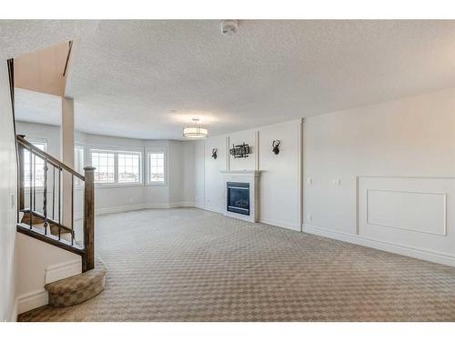 43 Prominence Path Sw, Calgary, AB - Indoor With Fireplace