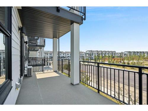 219-255 Les Jardins Park Se, Calgary, AB - Outdoor With Balcony With Exterior