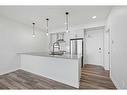 322-255 Les Jardins Park Se, Calgary, AB  - Indoor Photo Showing Kitchen With Upgraded Kitchen 