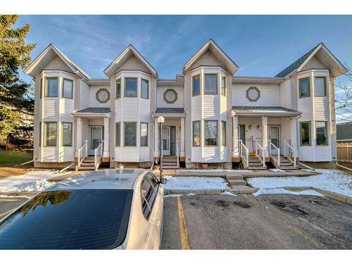 39 Abbeydale Villas Ne, Calgary, AB - Outdoor With Deck Patio Veranda With Facade