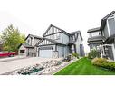 163 Sunset View, Cochrane, AB  - Outdoor With Facade 
