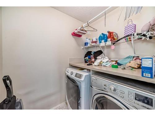 3 Fireside Place, Cochrane, AB - Indoor Photo Showing Laundry Room