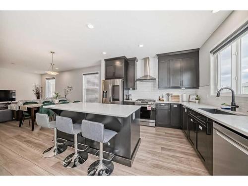174 Dawson Harbour Rise, Chestermere, AB - Indoor Photo Showing Kitchen With Upgraded Kitchen