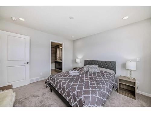 174 Dawson Harbour Rise, Chestermere, AB - Indoor Photo Showing Bedroom