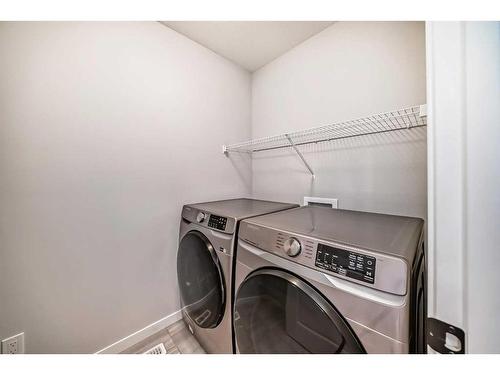 174 Dawson Harbour Rise, Chestermere, AB - Indoor Photo Showing Laundry Room