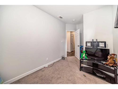 174 Dawson Harbour Rise, Chestermere, AB - Indoor Photo Showing Other Room