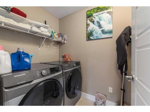 255 Baywater Way Sw, Airdrie, AB - Indoor Photo Showing Laundry Room
