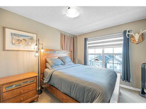 59 New Brighton Common Se, Calgary, AB - Indoor Photo Showing Bedroom