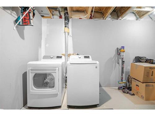 59 New Brighton Common Se, Calgary, AB - Indoor Photo Showing Laundry Room