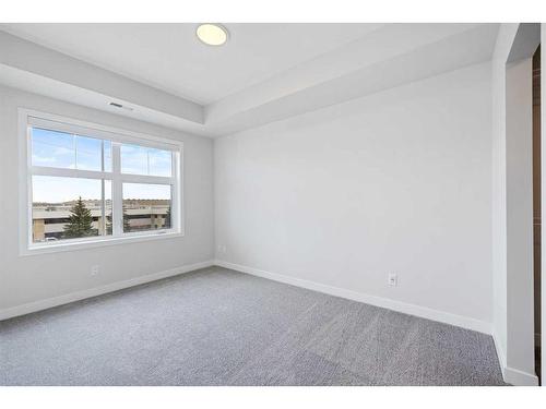 323-255 Les Jardins Park Se, Calgary, AB - Indoor Photo Showing Other Room