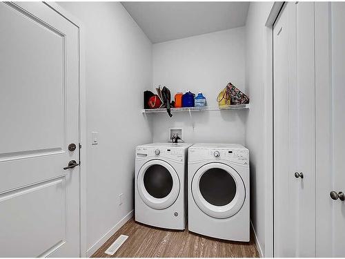 1713 Montgomery Gate Se, High River, AB - Indoor Photo Showing Laundry Room