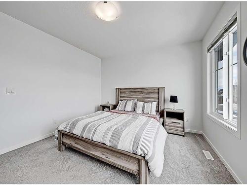 1713 Montgomery Gate Se, High River, AB - Indoor Photo Showing Bedroom