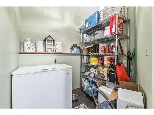 14 Hunters Gate, Okotoks, AB - Indoor Photo Showing Laundry Room