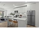 303-455 1 Avenue Ne, Calgary, AB  - Indoor Photo Showing Kitchen With Stainless Steel Kitchen With Upgraded Kitchen 