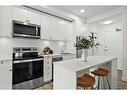 303-455 1 Avenue Ne, Calgary, AB  - Indoor Photo Showing Kitchen With Upgraded Kitchen 