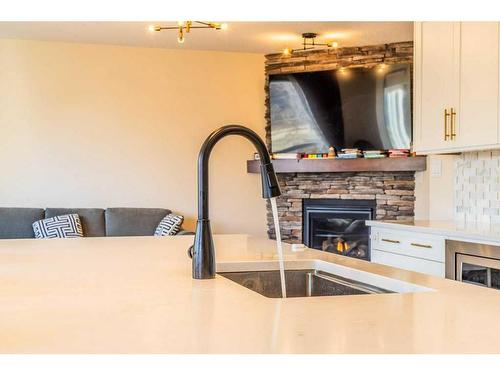 130 Topaz Gate, Chestermere, AB - Indoor With Fireplace