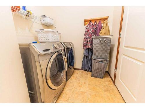 130 Topaz Gate, Chestermere, AB - Indoor Photo Showing Laundry Room