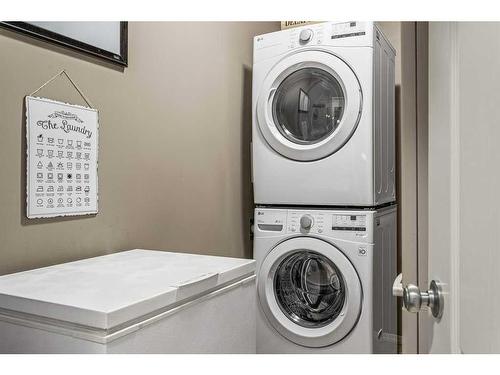 409-300 Palliser Lane, Canmore, AB - Indoor Photo Showing Laundry Room