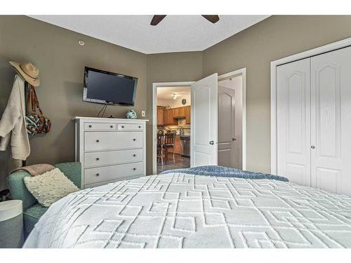 409-300 Palliser Lane, Canmore, AB - Indoor Photo Showing Bedroom