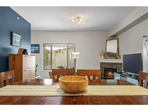 409-300 Palliser Lane, Canmore, AB - Indoor With Fireplace