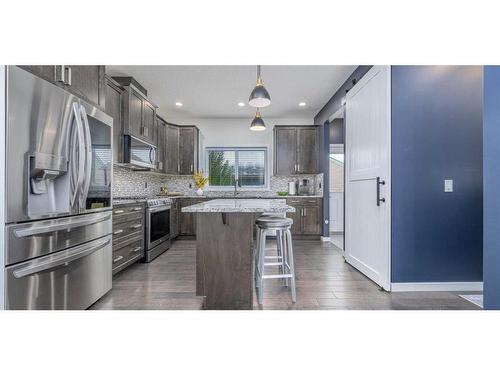 23 Walden Parade Se, Calgary, AB - Indoor Photo Showing Kitchen With Upgraded Kitchen