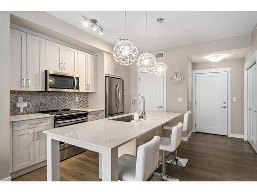 410-35 Walgrove Se, Calgary, AB - Indoor Photo Showing Kitchen With Stainless Steel Kitchen With Upgraded Kitchen