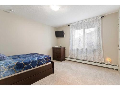 5039 Norris Road Nw, Calgary, AB - Indoor Photo Showing Bedroom