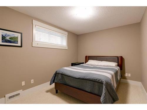 26 Aspen Dale Court Sw, Calgary, AB - Indoor Photo Showing Bedroom