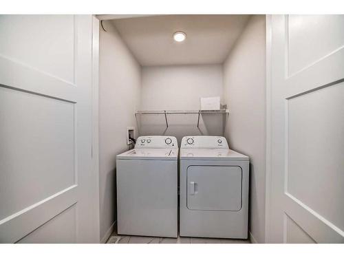 111 Livingston Avenue Ne, Calgary, AB - Indoor Photo Showing Laundry Room