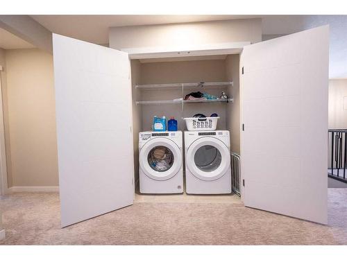 122 Magnolia Court Se, Calgary, AB - Indoor Photo Showing Laundry Room