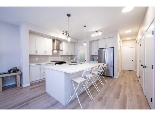 122 Magnolia Court Se, Calgary, AB - Indoor Photo Showing Kitchen With Stainless Steel Kitchen With Upgraded Kitchen