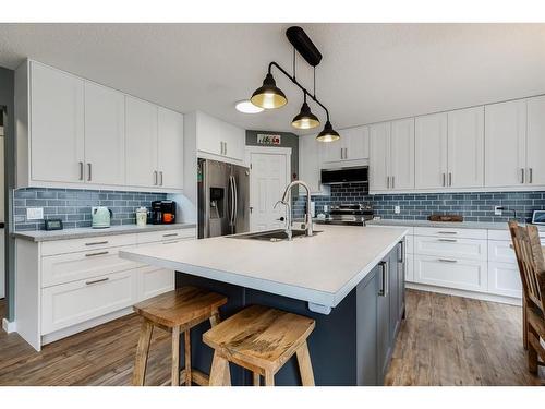 781 Cimarron Close, Okotoks, AB - Indoor Photo Showing Kitchen With Upgraded Kitchen
