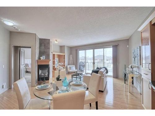 135 Everglade Way Sw, Calgary, AB - Indoor With Fireplace