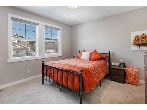 129 Fireside Place, Cochrane, AB - Indoor Photo Showing Bedroom