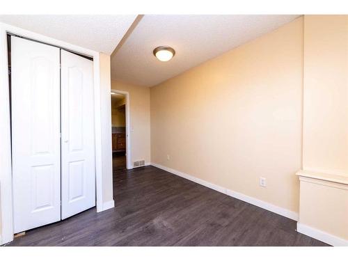 145 Hidden Spring Circle Nw, Calgary, AB - Indoor Photo Showing Other Room